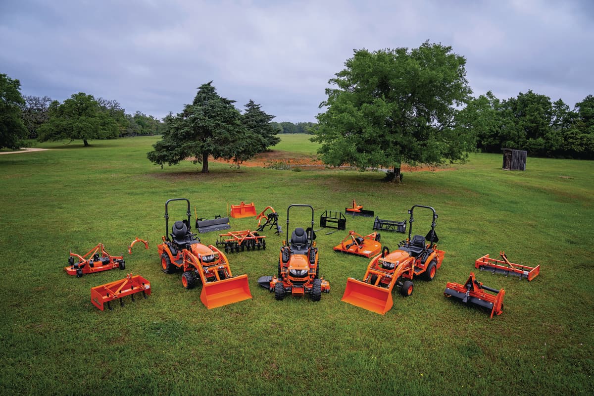 Lineup of tractors on a field