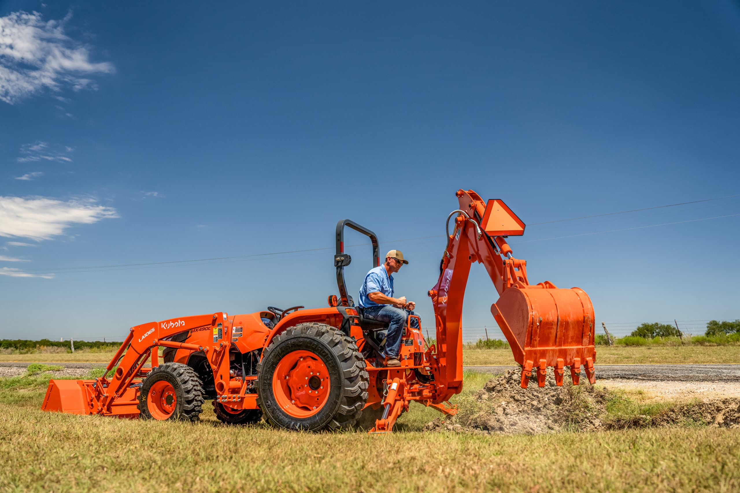 Kubota MX4900 tractor in field